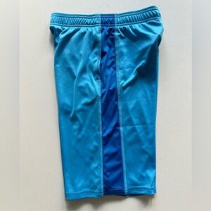Under Armour baby deep blue and royal shorts in size YL
